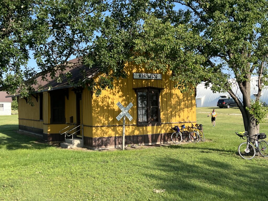 Historic train depot building in Kirwin, Kansas, showing classic small-town architecture with weathered charm.