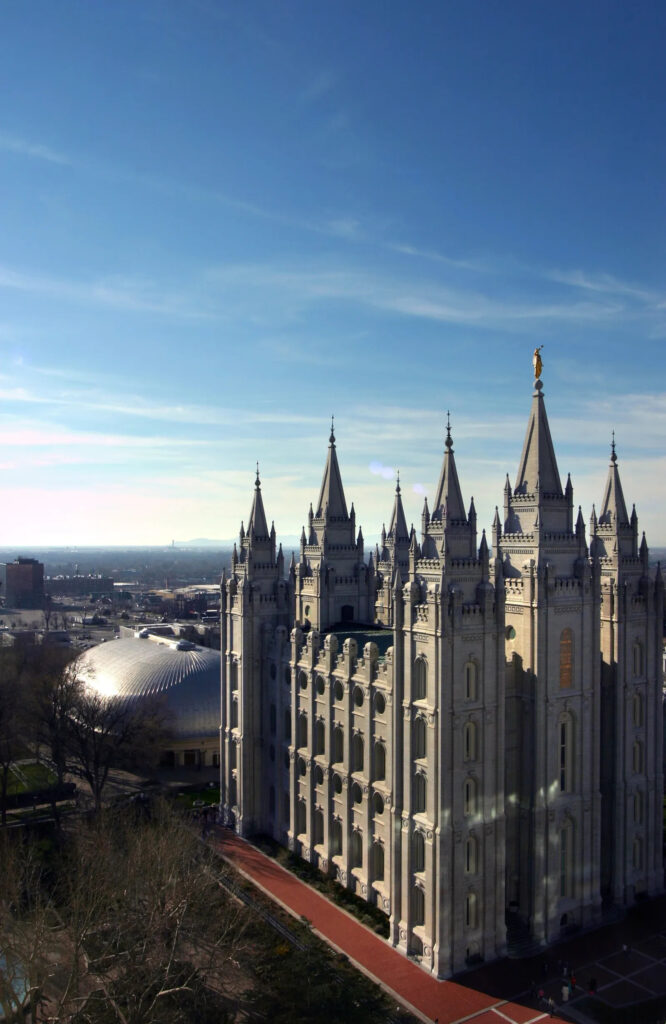 alt="Salt Lake Temple in Salt Lake City, Utah with clear blue sky and historic architecture"