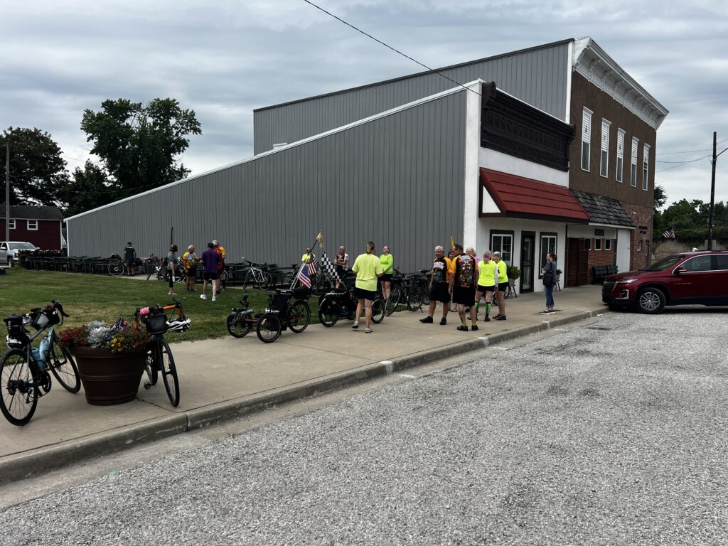 Bicycles lined up outside Guy & Mae’s Tavern in Williamsburg, Kansas, as riders wait for the 11 o’clock opening.