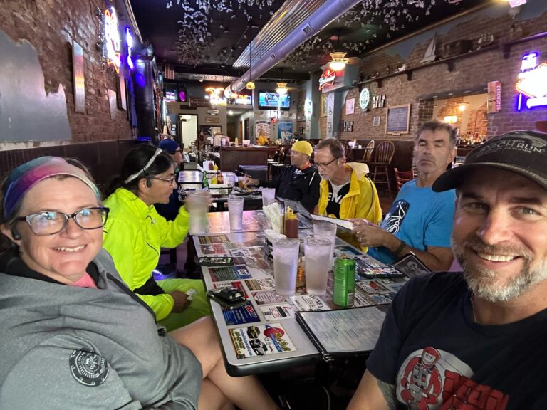 Cyclists from the Katy Trail enjoying dinner together at the Boonville Casino after a long, rainy ride.