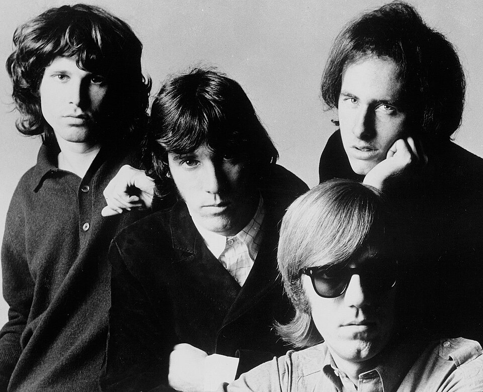 The Doors band members – Jim Morrison, Ray Manzarek, Robby Krieger, and John Densmore, portrait-style