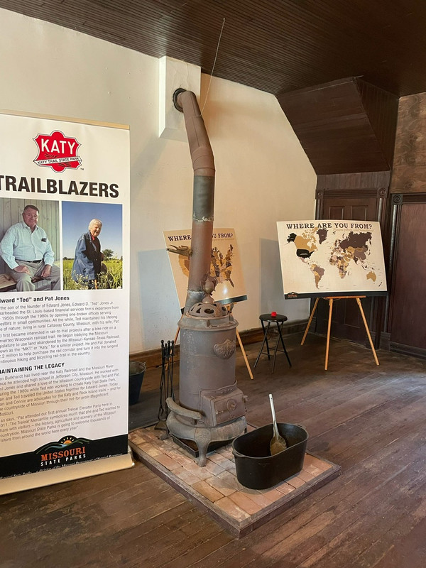 Old-time fireplace and world map display at the Welcome Center Museum in Trelore, Missouri, captured on a ShauneNation bike ride